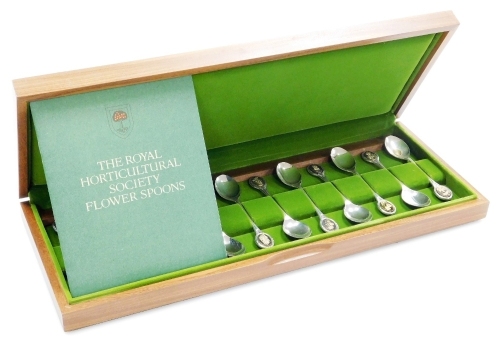 The Royal Horticultural Society silver flower spoons, cased with certificate of authenticity, John Pinches Ltd, Sheffield 1981, 9.87oz.