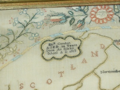 A George III silk work map of England and Wales, by Elizabeth Condon, aged 10 years, done at Sileby School, AD 1813, showing a map of England and Wales divided into its counties, in a surround of flowers, 53.5cm x 51cm. - 3