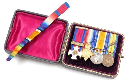 A group of World War I miniature medals, comprising DSO, 1914 Star, Great War and Victory Medals, together with the matching medal ribbons.