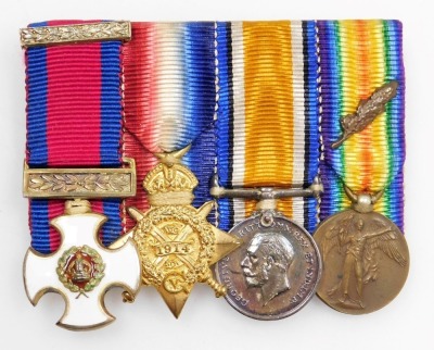 A group of World War I miniature medals, comprising DSO, 1914 Star, Great War and Victory Medals, together with the matching medal ribbons. - 2