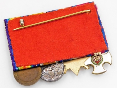 A group of World War I miniature medals, comprising DSO, 1914 Star, Great War and Victory Medals, together with the matching medal ribbons. - 3