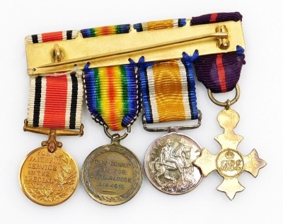 A group of World War I miniature medals, comprising OBE military, Great War and Victory Medals, with oak leaf, and a Special Constabulary Faithful Service medal, together with a group of World War II and later miniature medals, comprising 1939-45 Star, Af - 5