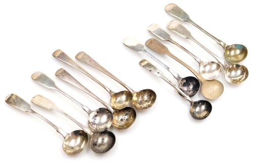 Twelve silver mustard spoons, various patterns, some bearing initials, various dates and assays, 3.81oz.