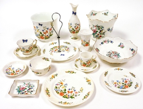 A group of Aynsley decorated in the Cottage Garden pattern, including a cake stand, jardiniere and a bowl, together with a jardiniere decorated in the Pembroke pattern. (a quantity)