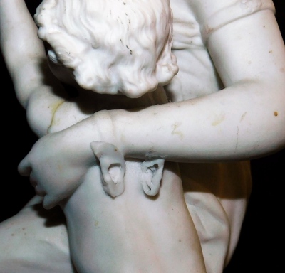 A late 19thC James and Thomas Bevington parian figure group, modelled as a Roman lady seated with a putto, on an oval naturalistic base, impress marks, 39cm high. (AF) - 6