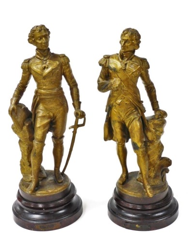 A pair of late 19thC spelter figures of Nelson and Wellington, gold painted, raised on stained wooden socles, with name plates, 44cm high.