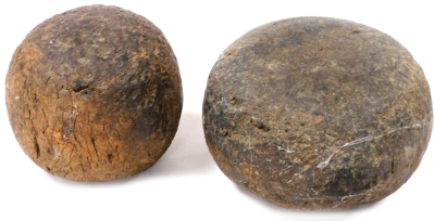 Two 19thC bakery dampers, one of wooden ball form, 12cm wide, the other of compressed cylindrical form, 15cm wide. (2)