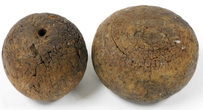 Two 19thC bakery dampers, one of wooden ball form, 12cm wide, the other of compressed cylindrical form, 15cm wide. (2) - 2