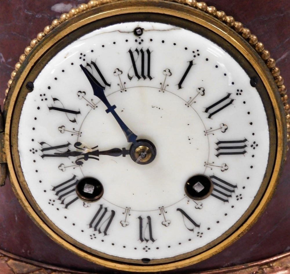 a-late-19thc-french-porphyry-marble-cased-mantel-clock-circular-enamel-dial-bearing-roman