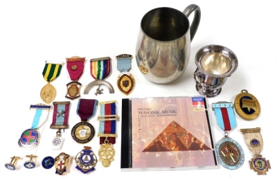 A group of Masonic memorabilia, including silver and base metal jewels, pair of cufflinks, and a Decca CD of Mozart Masonic music, together with a plated tankard and a plated Viners match holder. (a quantity)