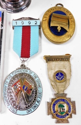 A group of Masonic memorabilia, including silver and base metal jewels, pair of cufflinks, and a Decca CD of Mozart Masonic music, together with a plated tankard and a plated Viners match holder. (a quantity) - 3