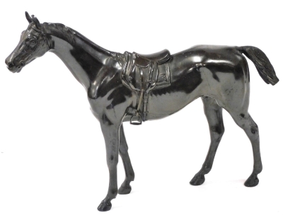 A bronzed spelter model of a thorough bred horse, bears SP in a shield mark, 31cm wide.