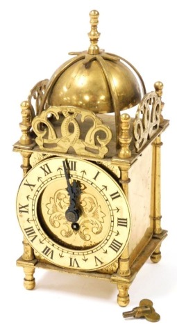 A Smiths brass Nell Gwynne bijou lantern clock, with clock work movement, key, boxed with certificate, 18cm high.