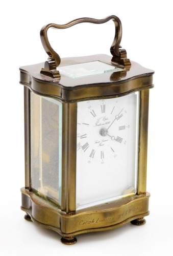 A L'Epee brass cased carriage clock, the dial inscribed L'Epee Fondee 1839, Saint Suxanne France, bearing Roman and Arabic numerals, single barrel movement, in shaped case engraved Corah Limited 1979 B. Wilcox, with carrying handle, 11cm high.