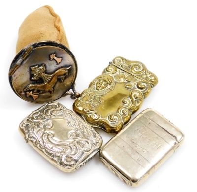 Three Vesta cases, comprising an early 20thC brass case with embossed scroll decoration and figure head of a lady with flowing hair, and two silver plated examples, one engraved WJ From WN 26th July 1877, and a powder case with plated lid with applied erm