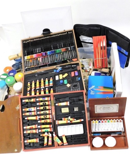 Artist related materials, to include Pip Seymour acrylic colours, paint pallet, Crimson and Blake colouring pencil and wax crayon set, various Crimson and Blake oil paints, canvases, paintbrushes, metallic gold finish spray can paint, Indian ink, acrylic