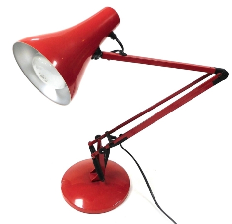 An Anglepoise red model 90 table lamp.