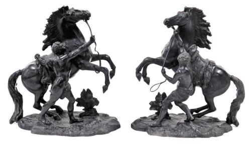 A pair of spelter Marley horses, 31cm wide.