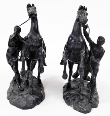 A pair of spelter Marley horses, 31cm wide. - 2