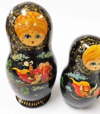 A Russian Babushuko doll, nine graduated with painted decoration, largest 24cm high. - 4