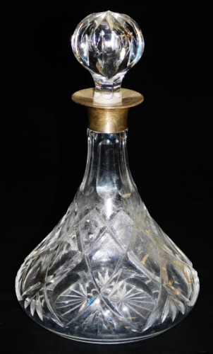 An Elizabeth II cut glass ship's decanter, with silver mount, JB Chatterley and Sons Ltd, Birmingham 1973, 29cm high.