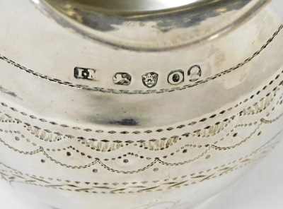 A George III silver cream jug, of helmet shaped form, with angular handle and bright cut decoration, monogrammed to body, John Merry, London 1789, 3.31oz, 8cm high. - 2