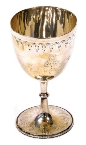 A Victorian silver goblet, bright cut decorated with presentation inscription 'WR 9th October 1862', hallmarks rubbed, 6.50oz, 15cm high.