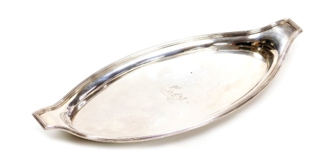 A George III silver twin handled snuffers stand, of oval form, with raised sides, engraved crest to centre, Peter Podio, London 1793, 4.87oz, 25cm wide.