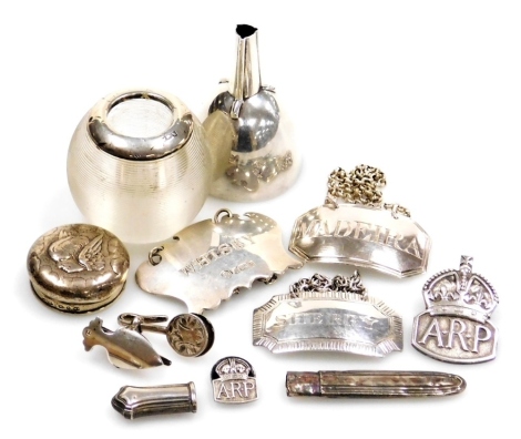 A group of small silver, to include a Victorian wine funnel, London 1860, glass match strike with silver collar, toothpick holder, ARP badge, tie clips, decanter labels, etc., weighable silver 2.23oz.