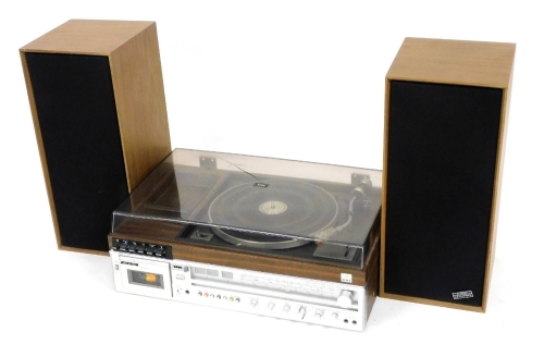 An Aiwa AF5080 stereo music centre, with turntable radio and cassette player, together with a pair of Celestion Ditton 15 speakers.