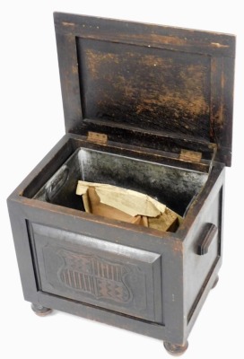 An early 20thC oak coal box, carved to the lid with a galleon, coat of arms to the front, raised on turned feet, 41cm high, 43cm wide, 33cm deep. - 2