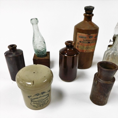 Victorian glass bottles, storage jars including Stephens blue black writing fluid and Tuxford & Tebbutt Limited Stilton cheese, and a Dr Ely Parson's Famous Miracle oil lamp. (a quantity) - 2