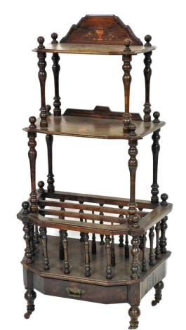 A Victorian rosewood and inlaid waterfall Canterbury whatnot, inlaid with urns and scrolls, with two shelves raised on turned columns, over a three section Canterbury, raised on turned legs, on castors, 132cm high, 66cm wide, 35cm deep.