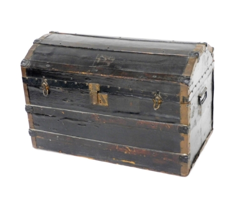 A Victorian leather trunk, wooden and metal bound with twin carrying handles, 55cm high, 85cm wide, 47cm deep.