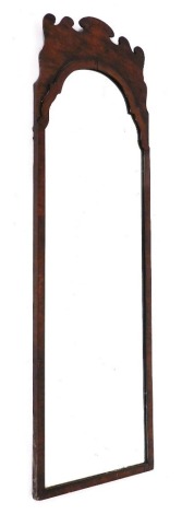 A Georgian style walnut fret work wall mirror, 121cm x 37cm.