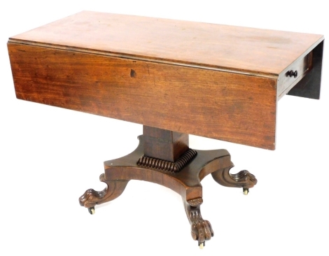 An early Victorian mahogany Pembroke table, the rectangular top above a frieze drawer, on a square tapering column, a concave platform and paw feet, with brass castors, 74cm high, 49cm wide, 112cm long.