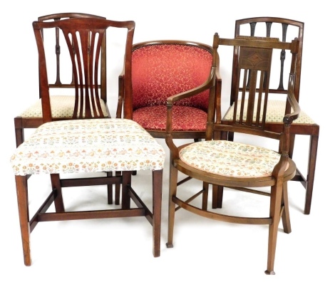 A late Victorian mahogany tub chair, Edwardian oval seated chair, Georgian style mahogany single dining chair and two further dining chairs. (5)