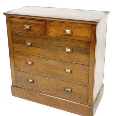 A Victorian oak chest of two short over two long drawers, raised on a plinth base, 104cm high, 105cm wide, 52cm deep.