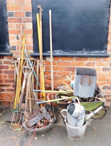 Various garden tools, to include rake, forks, spades, wheelbarrow, galvanised metal watering can, bucket, wall pocket, shears, etc. (a quantity)