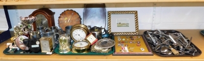 Various bowls, trophies, an Acctim mantel clock with Arabic numeral dial and Westminster chime, 25cm high, anniversary clock, various bowling club pin badges, loose flatware, etc. (a quantity)