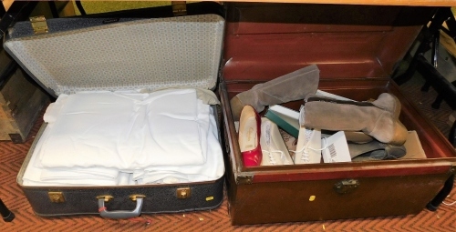 Various lady's shoes, to include Clarks court shoes, plimsolls, loafers, a tin trunk, and a suitcase containing table linen.