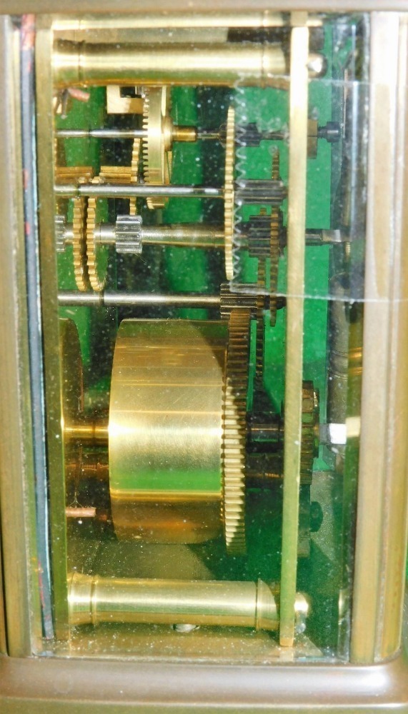 An early 20thC brass cased carriage clock, with Roman numeric Arabic