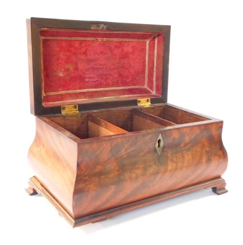 A George III flame mahogany bombe tea caddy, with brass swan neck handle and ogee bracket feet (AF), 17cm high, 26cm wide.