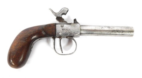 A 19thC percussion pocket pistol, with walnut handle, 18cm.