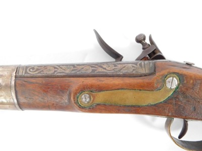 A 19thC flintlock pistol, with silvered mounts and engraved lock with ramrod, 47cm. - 3