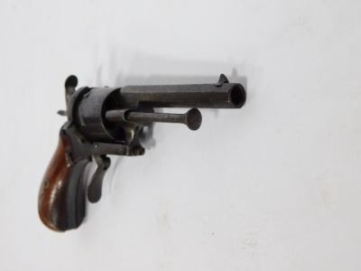 A 19thC 7mm Rim Fire pocket pistol, with walnut handle, 17cm. - 2