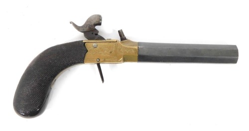 A 19thC box lock percussion pistol, with retractable trigger, octagonal steel barrel, brass lock, and walnut handle, 20cm.