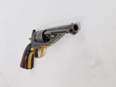 A 19thC Colt .38 calibre Rim Fire conversion pistol, patents for 1871 and 1872, stamped with serial nos. 11400 and 23124, with brass fittings and walnut handle, 22cm. - 2