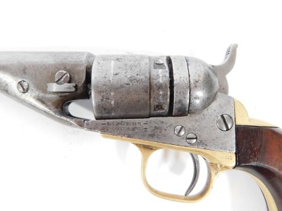 A 19thC Colt .38 calibre Rim Fire conversion pistol, patents for 1871 and 1872, stamped with serial nos. 11400 and 23124, with brass fittings and walnut handle, 22cm. - 3