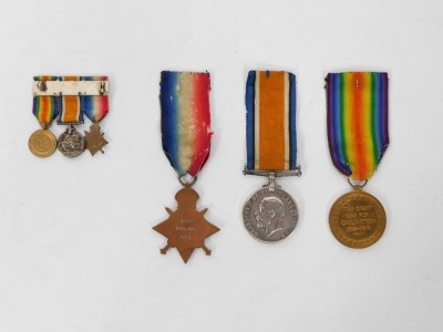 A World War I medal trio, engraved 27039 Gnr L. Coe RA, together with dress miniatures, the 1914 Star stamp 27039 Gnr L. Coe R.F.A. - 2